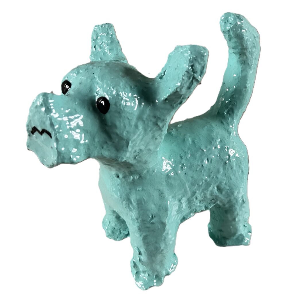 Blue sculpture of a chihuahua dog with expressive face